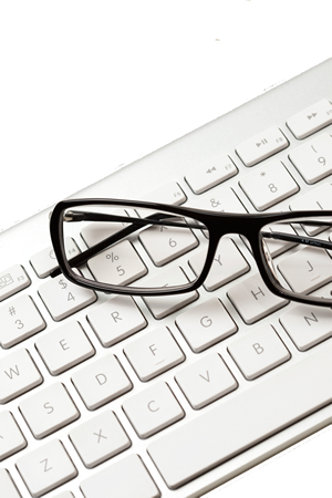 Eyeglasses on a keyboard